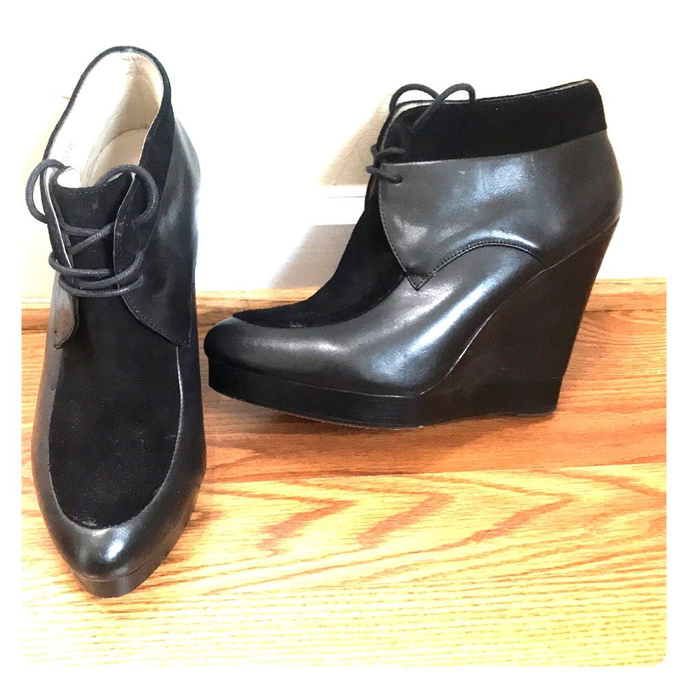 Michael Kors wedge black booties with laces.